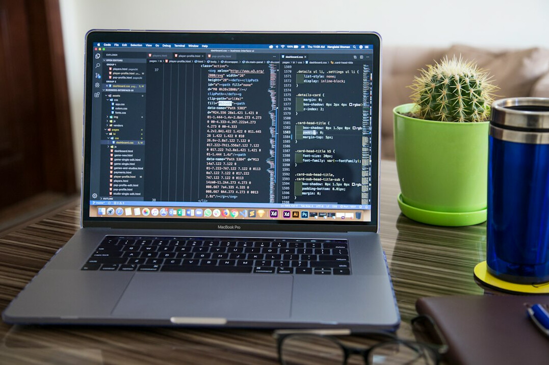 laptop with code editor